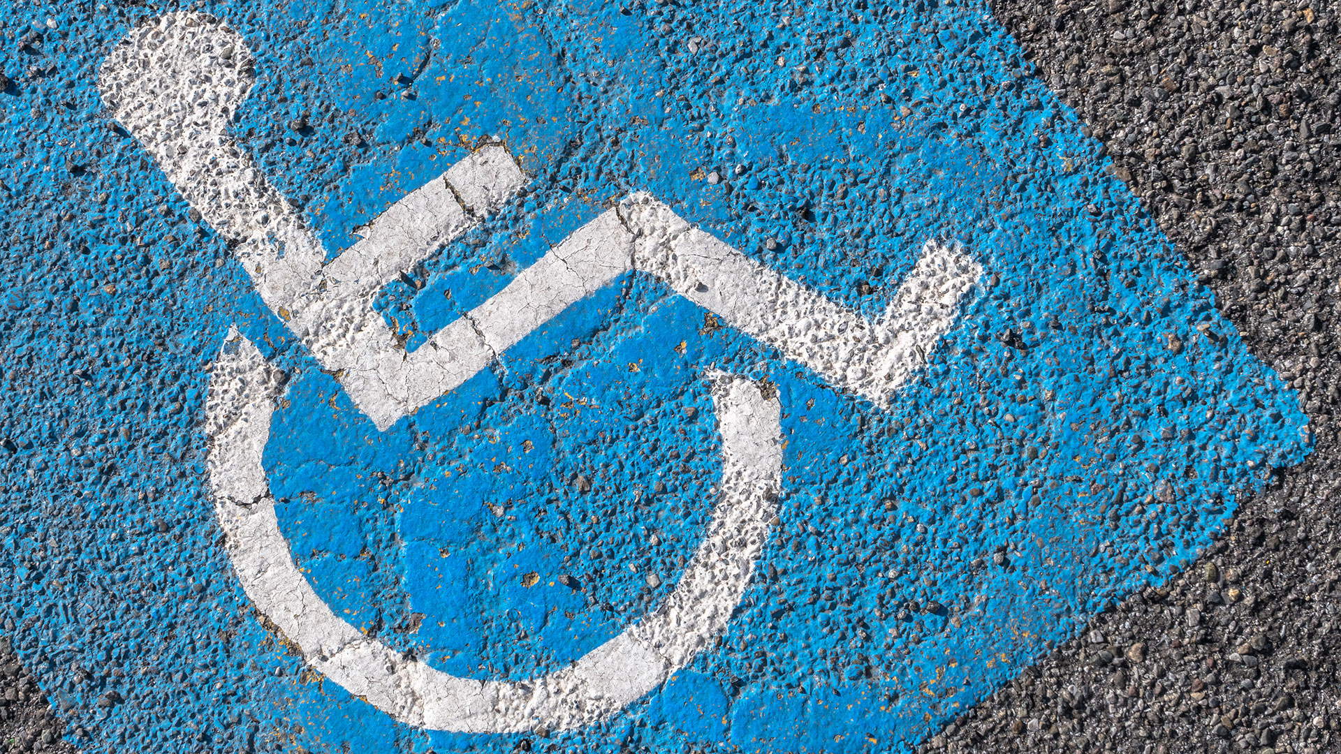 Close-up of disabled parking sign