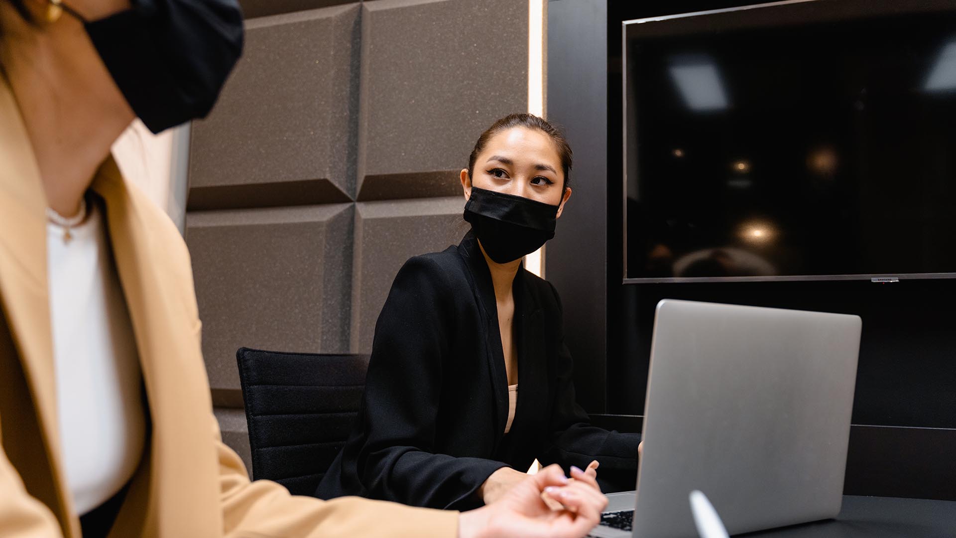 Workers wearing masks in office